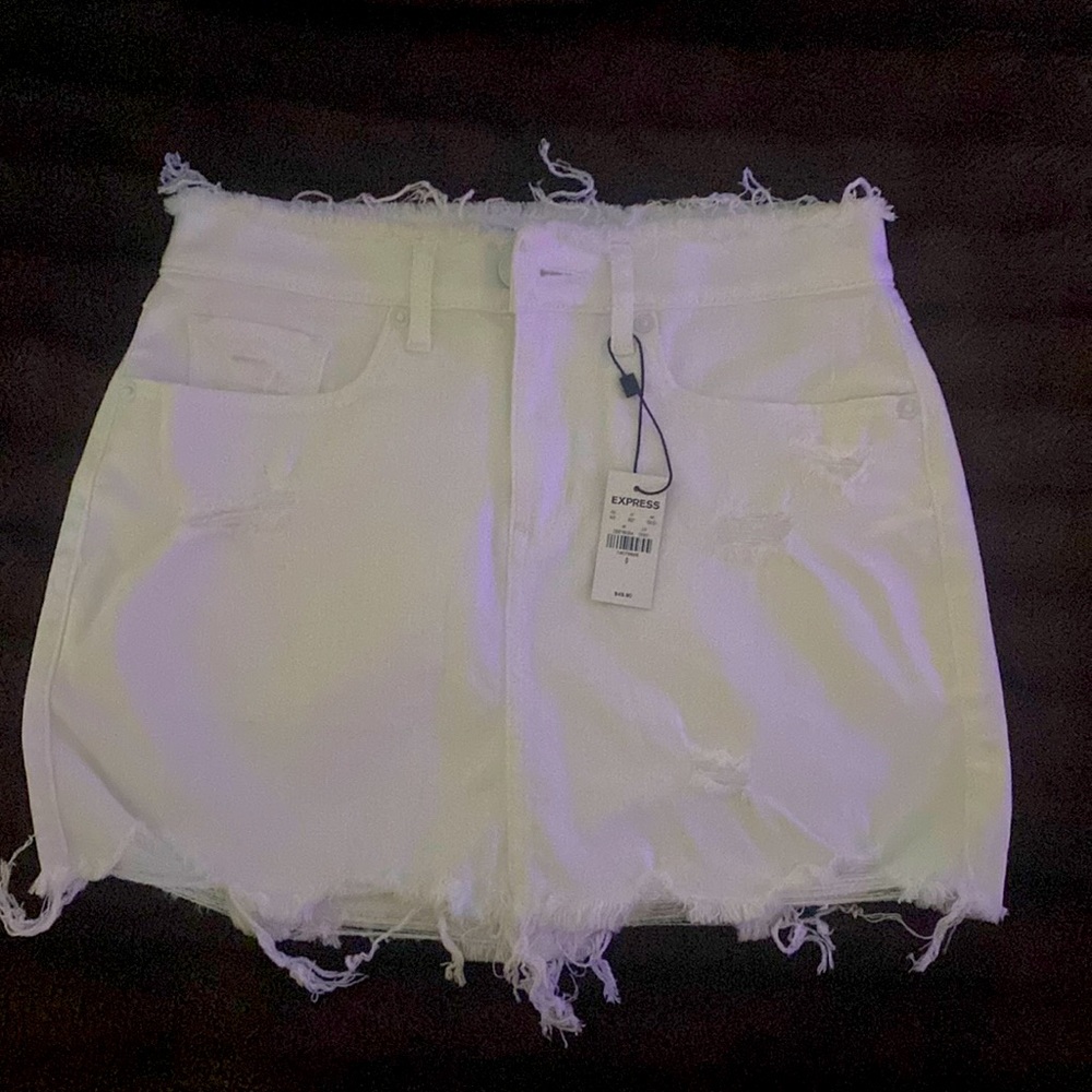 EXPRESS size 0 white denim mini skirt. Super cute never worn. New/with tags